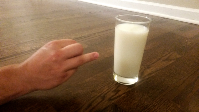 Illustration for article titled Astounding: 7 Incredible Photos Of Hands Pointing To Glasses Of Milk With Their Ring Fingers